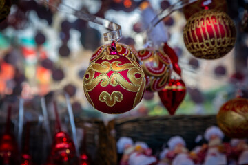 A close up of baubles displayed for sale, at a winter market in Europe