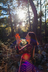 girl alone with nature. young and beautiful girl among natural landscapes.