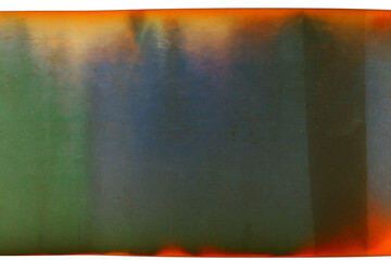 Grungy color 120mm negative film isolated on white background. Medium format film material on white...