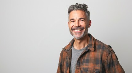 Fototapeta premium Smiling Man in Plaid Shirt