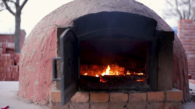 clay oven outdoors - the traditional Argentine barbecue in Silvio Pellico, Cordoba