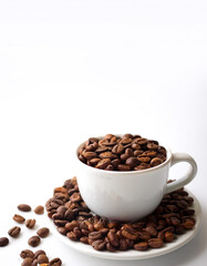 Fototapeta premium Coffee cup with coffee beans on side position provides copy space for text. background concept isolated white