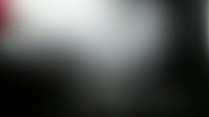Minimalist black background with a soft gradient from dark gray to light black, designed with high resolution and subtle texture for enhanced visual impact. This background features a delicate, blurry