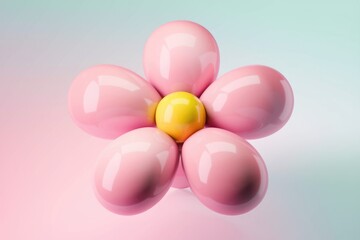 A pink flower made of balloons with a yellow center