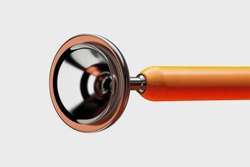 A close up of a medical instrument with an orange handle and a reflective metal tip.
