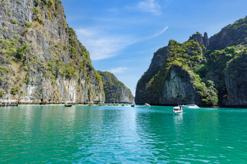 Many fishing boat with tourists in the beautiful crystal clear water at Pileh Lagoon, Krabi, Southern of Thailand, on May 30,2023 in Phi Phi National Park, Krabi Province Thailand