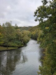 A river winds through a green landscape