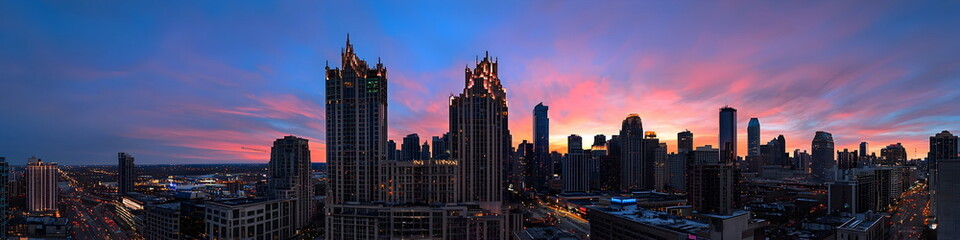 Fototapeta premium Manhattan Skyline at Sunset: A breathtaking view of the iconic Manhattan skyline at sunset, showcasing the vibrant city lights and the majestic skyscrapers against a colorful sky.