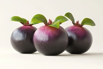 Fototapeta premium Three mangosteens on neutral background