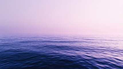 Obraz premium A smooth gradient transition from deep blue to soft lavender tones