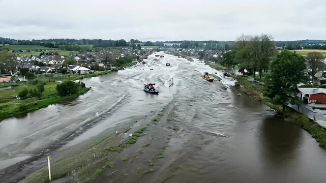 Witness devastating impact extensive floods captured dramatic aerial 4K drone footage daytime recording highlights operational challenges posed stormy ather conditions disaster