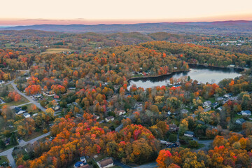 Lake Neepaulin Sussex NJ dusk in Autumn aerial Wawayanda Mountains Vernon in background