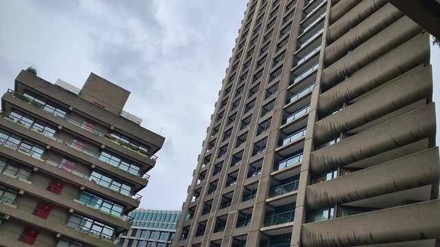Low-Angle View Of Barbican Estate, Shakespeare Tower, Concrete Residential Block Projecting Balconies, Brutalist Architecture, City Of London, England