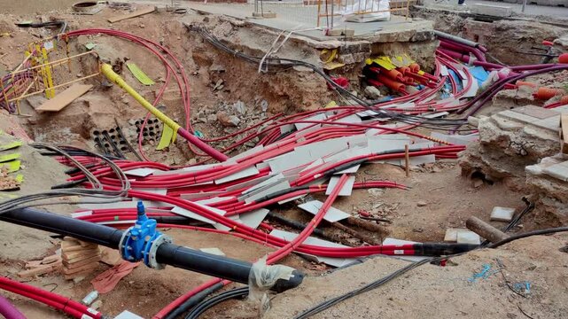 Underground cabling works.Smooth camera movement: Panning Left. 
View of the installation of new fibre optic networks and other services in the city of Barcelona.
