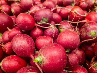 Radish background. Radishes are on the counter in the store. Radish near