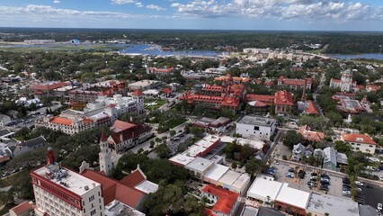 Fototapeta premium Downtown St Augustine Florida Aerial view of streets, shops, historic building and homes on a day of sunshine at this beach front historic city which is a tourist destination of families on vacation 