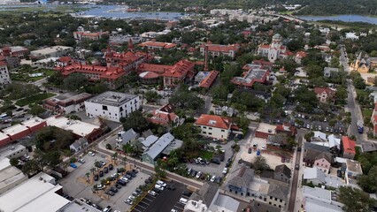 Obraz premium Downtown St Augustine Florida Aerial view of streets, shops, historic building and homes on a day of sunshine at this beach front historic city which is a tourist destination of families on vacation 
