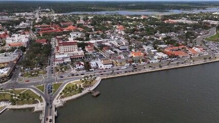 Fototapeta premium Downtown St Augustine Florida Aerial view of streets, shops, historic building and homes on a day of sunshine at this beach front historic city which is a tourist destination of families on vacation 