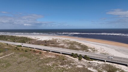 Travel by the Florida coastline on A1A scenic byway passing through St Augustine Beach by coastal homes by beautiful beaches and waterways