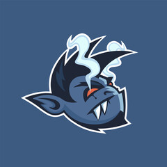 Monster mascot logo with burning eyes smoke and sharp teeth