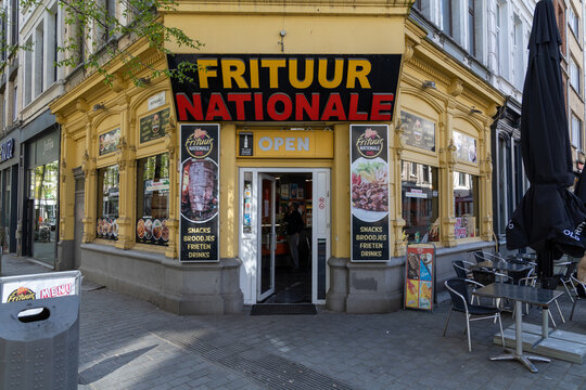 Frituur Nationale snackbar. A fastfood snackbar for frites, drinks fries, chips, Sandwiches. Antwerp, Belgium. 15 April 2023. 