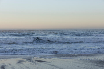 Beach and sea background, view of the Atlantic ocean, from a city in Europe.