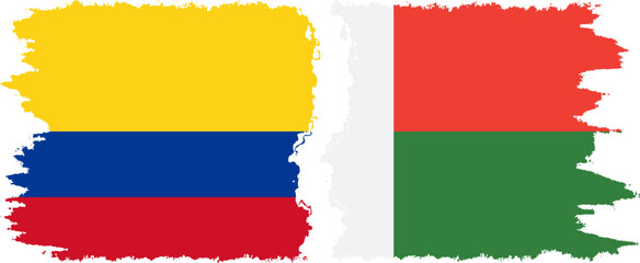 Madagascar and Colombia grunge flags connection, vector