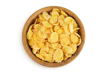 Cornflakes in wooden bowl isolated on white background. Top view. Flat lay
