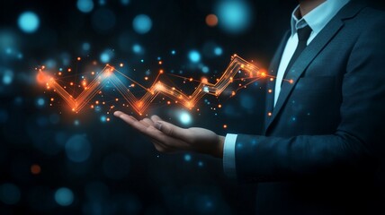 Business professional displaying digital financial trends with glowing graphs in a dark background