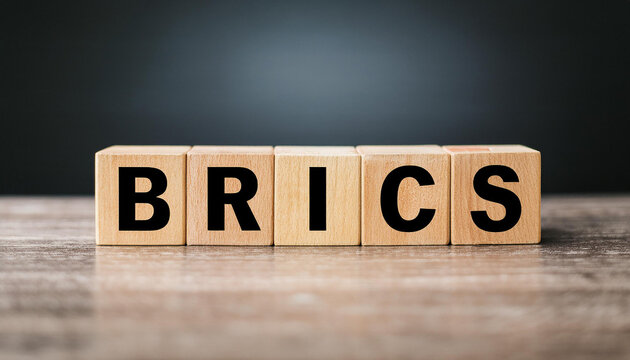 Wood cubes with abbreviation text BRICS on wooden table. Intergovernmental organization
