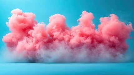 Fototapeta premium cloud of pink party smoke isolated against a backdrop of blue and teal, creating a lively atmosphere, vibrant colors swirling together in a playful, celebratory display of creativity