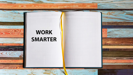 Work Smarter on a more thoughtful text on a notepad and a beautiful background