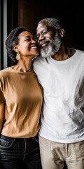 Fototapeta premium A man and woman are hugging each other. The man is wearing a white shirt and the woman is wearing a brown shirt