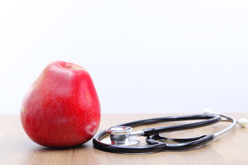 Apple as a symbol of taking care of your health, regular check-ups and taking care of yourself and your health