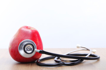 Apple as a symbol of taking care of your health, regular check-ups and taking care of yourself and your health