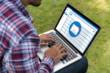 Email notification message showing on computer screen snugly. Digital marketing message information text from business to customer client