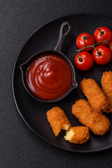 Delicious crispy cheese sticks with mozzarella, salt and spices