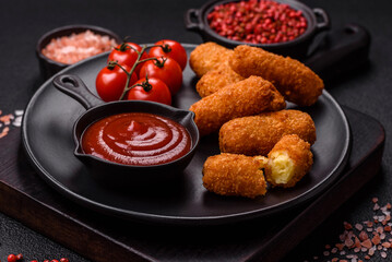 Delicious crispy cheese sticks with mozzarella, salt and spices