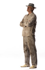 Portrait of an elderly man in dirty clothes on a white background