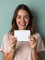 friendly young female psychologist girl holding happy emotion face card