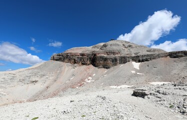 Peak of the Dolomites called Piz Boe where there is the alpine refuge called CAPANNA Fassa at 3152 meters above sea level in the Alps of Northern Italy in Summer