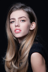 Naklejka premium High fashion photo. Fashionable woman. Fashion beauty portrait. Portrait of a gorgeous young woman. Elegant Lady. Beautiful Model. High fashion portrait of elegant woman. Beauty face. Fashion shooting