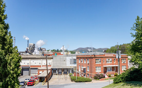CANTON, NC, USA-4 MAY 2023: Pactiv Evergreen papermill, buildings, loading docks and smokestacks.