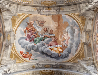 ASTI, ITALY - SEPTEMBER 11, 2024: The ceiling fresco of apostles Simon, Jude and Matthias with the...
