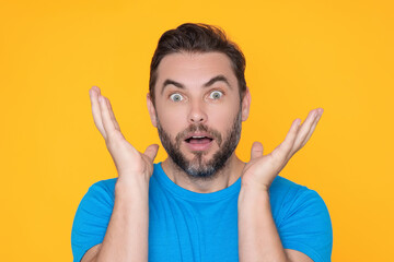 Studio isolated portrait of middle aged man with surprise facial expression. Man Hispanic man worried and nervous, concerned and surprised expression. Fear and excited male face. Amazement concept.