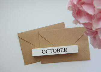 Autumn month October and brown envelopes