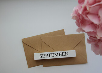 Autumn month September and brown envelopes