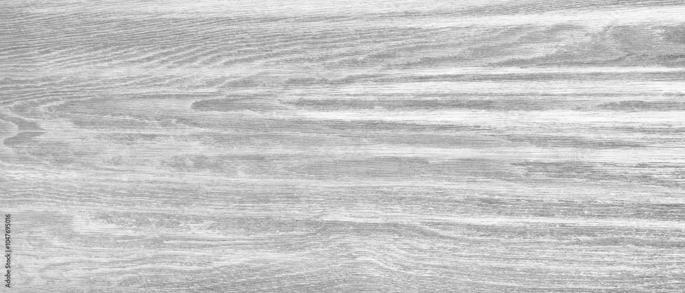 Aufkleber a wooden surface with a grainy texture. the wood is white and he is unfinished. the surface is smoot