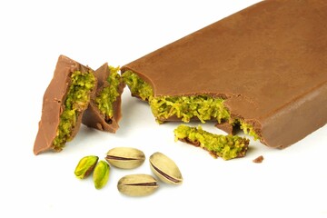 Dubai chocolate with green pistachio nuts kadaif dessert    on white background.  