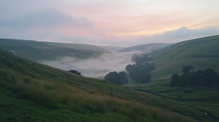 Fototapeta premium Pastel Sunrise Over Rolling Hills with Soft Mist